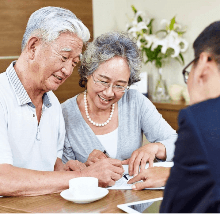 A couple of people sitting at a table